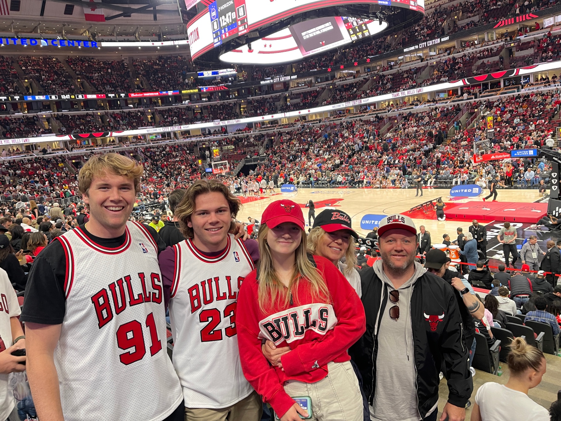 Indi with family at a Chicago Bulls game