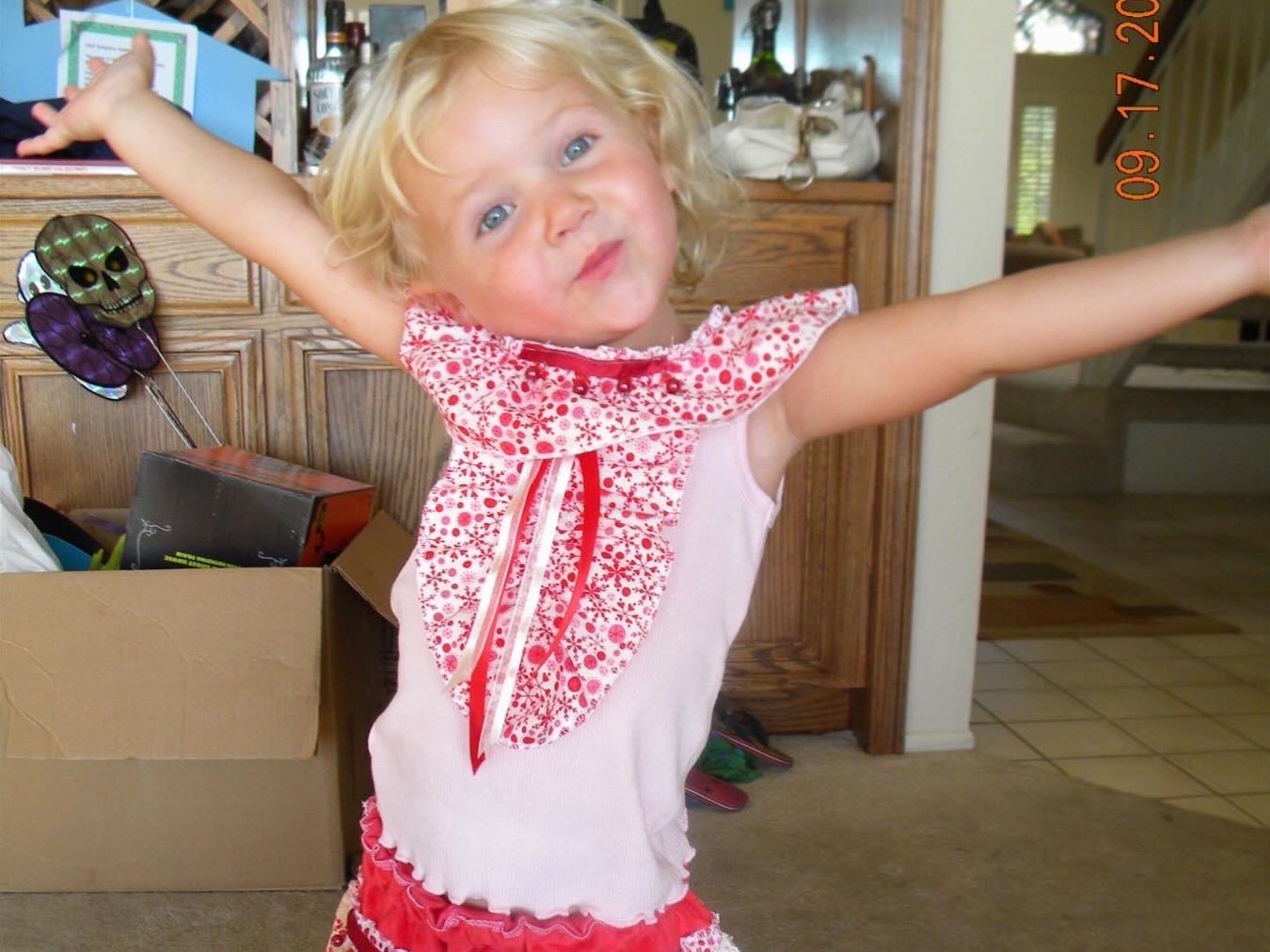 Toddler Indi with arms wide open