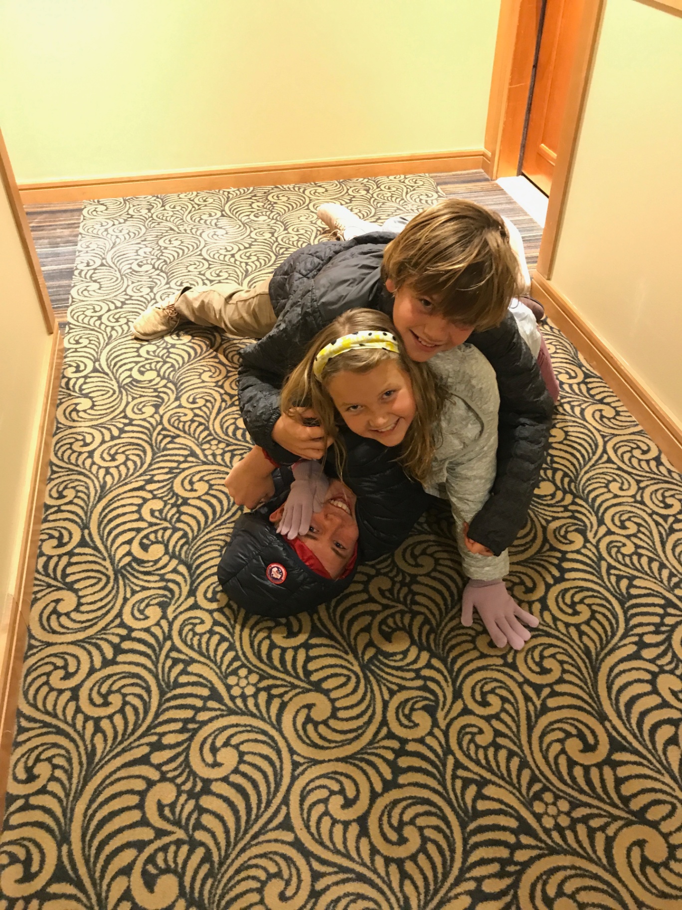 Indi and brother piled on dad
