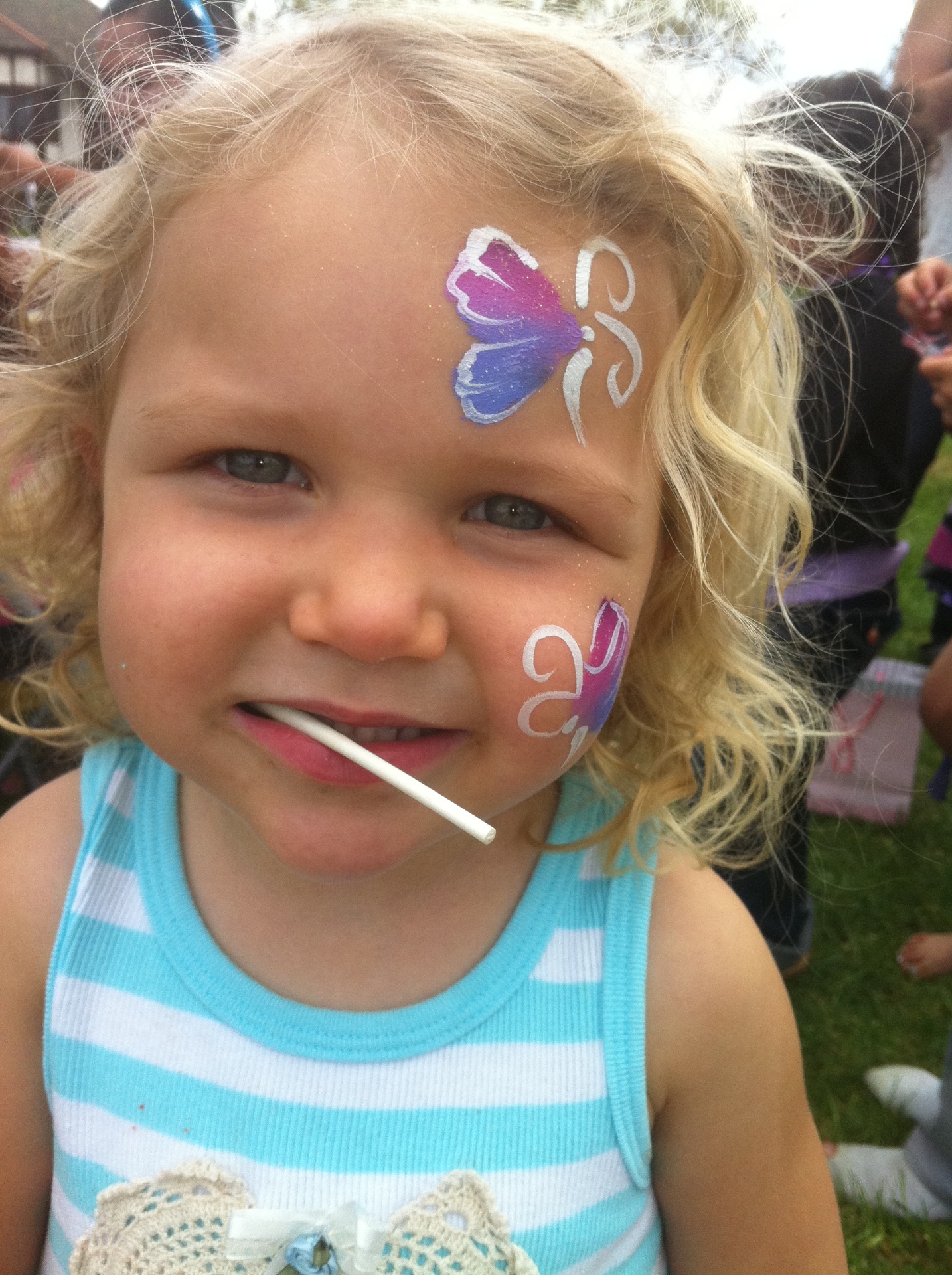 Indi with butterfly face paint