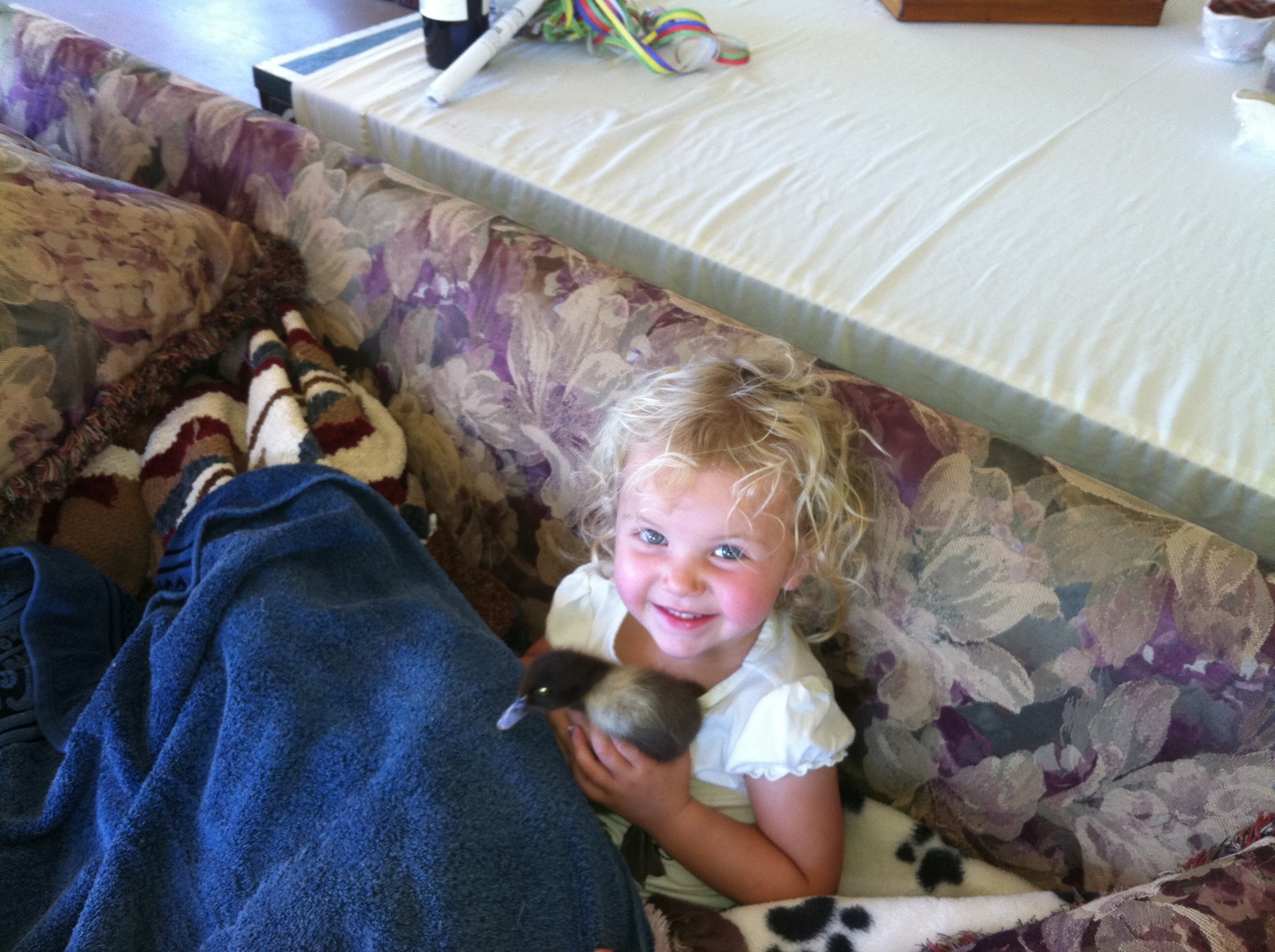 Indi holding a duckling
